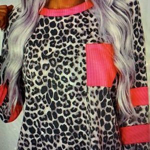 NEW long sleeve cheetah print with pink accents.